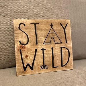 “Stay Wild” wall sign